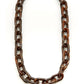 Brillenkette bestehend aus großen braunen Kettengliedern